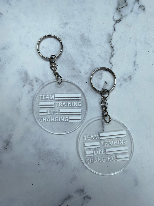 Team Training Life Changing Round Keychain