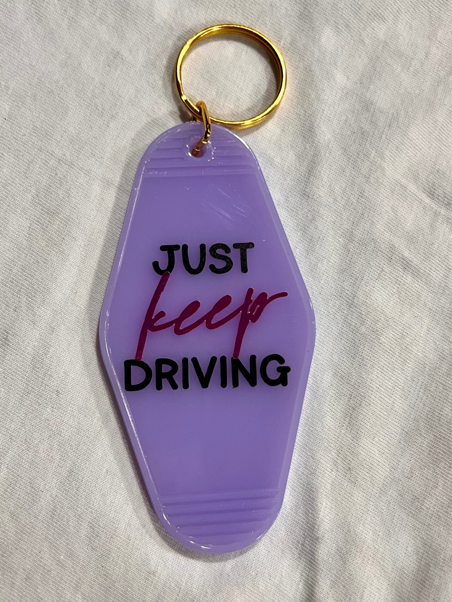 keep driving motel style keychain