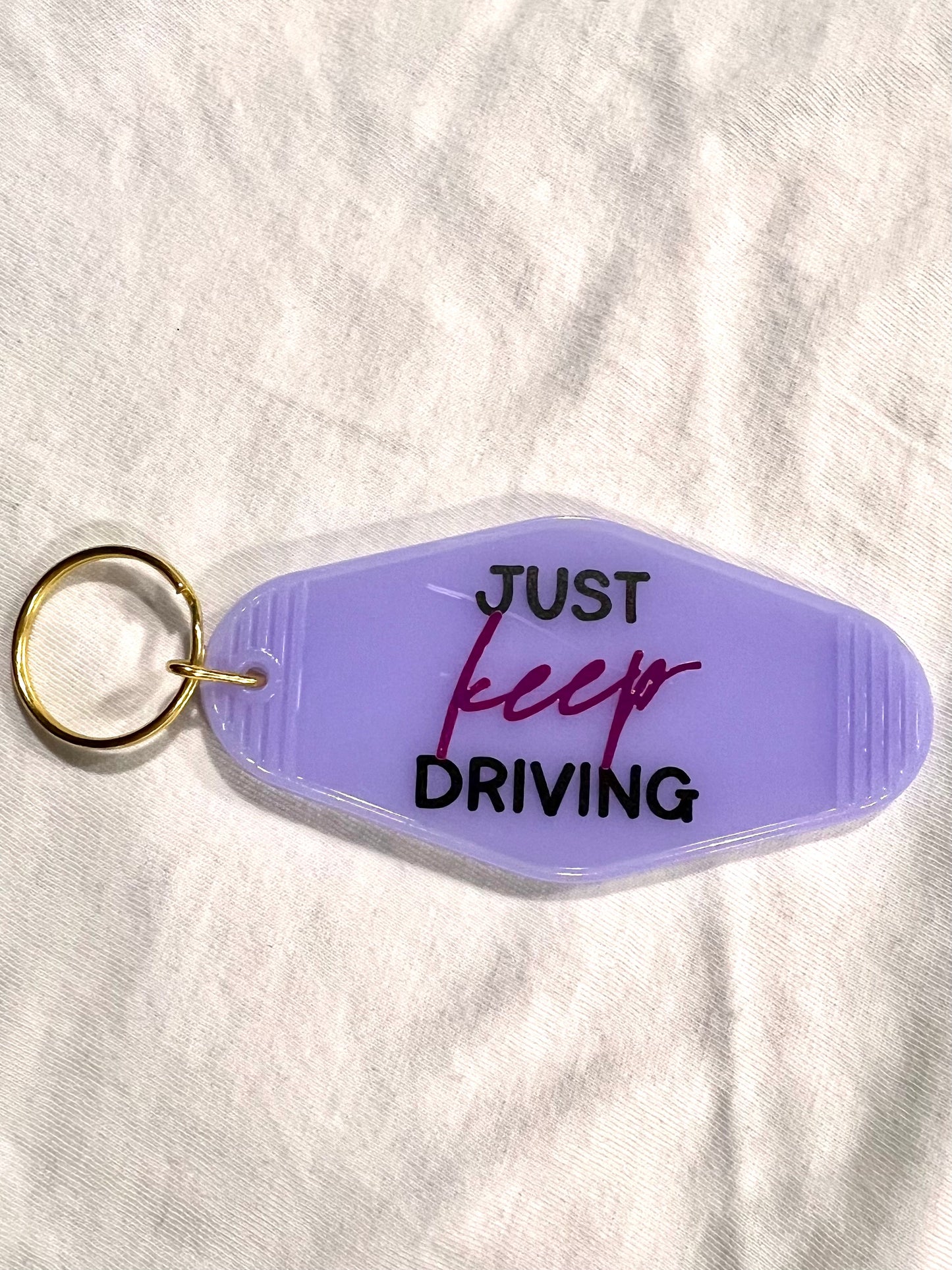 keep driving motel style keychain