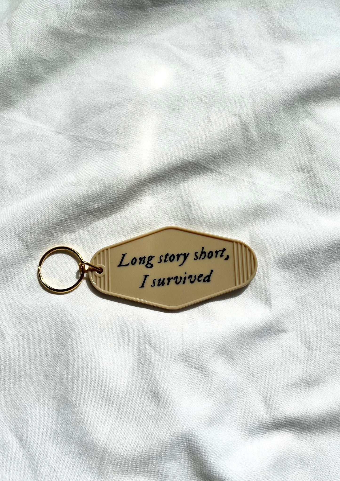 Long Story Short motel style keychain