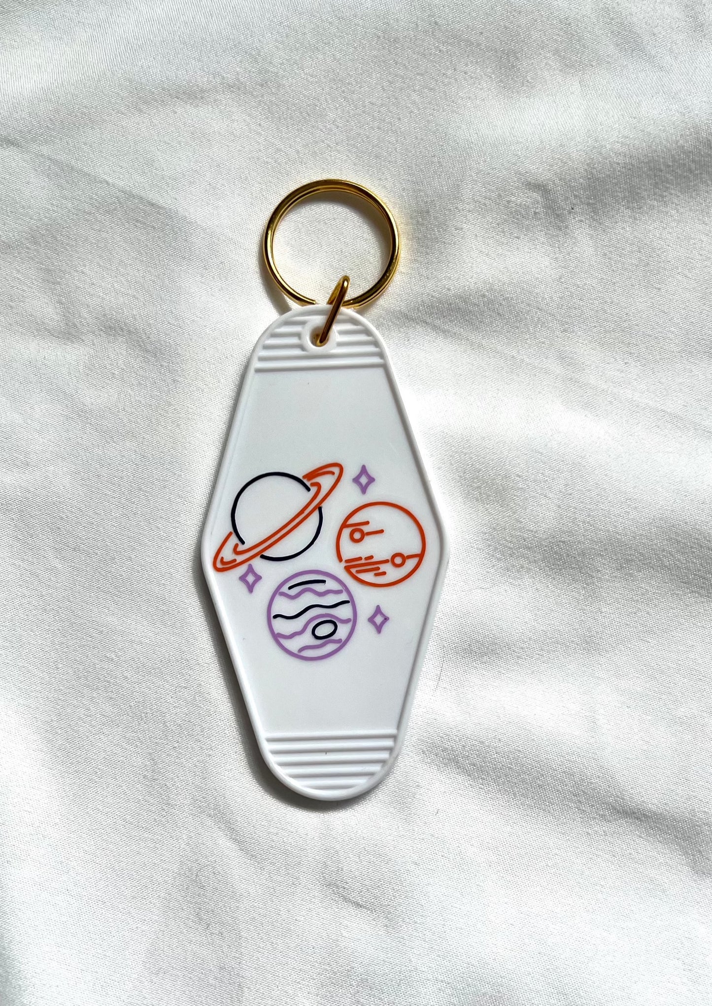 Spinning Out motel style keychain